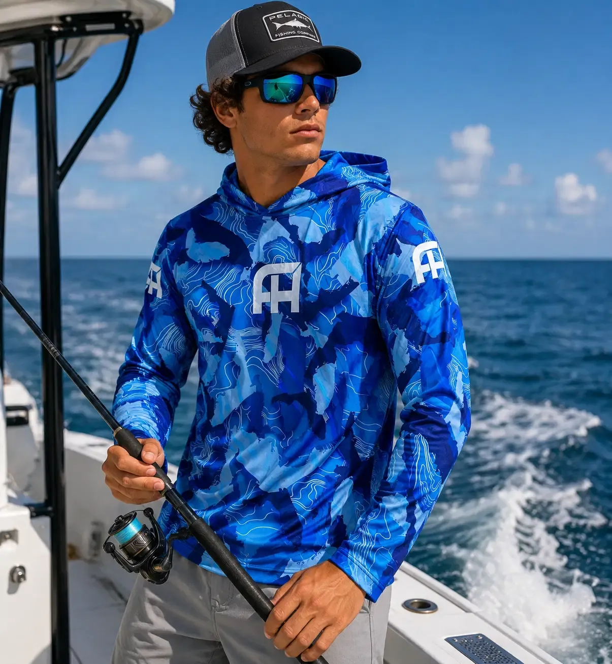 Angler wearing custom performance fishing hoodie