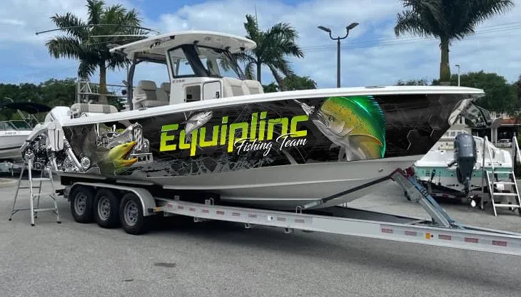 Equiplinc Fishing Team boat with custom hull wrap and fish illustrations